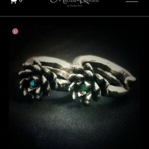 Martha Rotten adjustable succulent ring with crystal in middle.